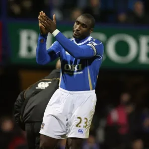 Ex Arsenal player Sol Campbell salutes the arsenal fans during the match
