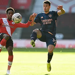 FA Cup Fourth Round: Southampton vs. Arsenal - Gabriel Martinelli's Battle with Walker-Peters Amid Empty Stands