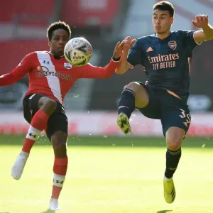 FA Cup Fourth Round: Southampton vs. Arsenal - Gabriel Martinelli's Battle with Walker-Peters Amid Empty Stands FA Cup Fourth Round: Southampton vs. Arsenal - Gabriel Martinelli's Battle with Walker-Peters Amid Empty Stands
