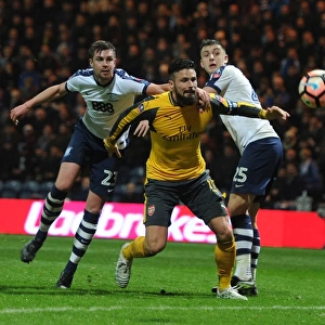 FA Cup Showdown: Olivier Giroud vs Preston Defenders - A Battle for the Ball