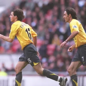 Fabregas and Pires: Unstoppable Duo Celebrates Arsenal's Dominance over Sunderland (2006)