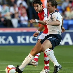 Fabregas vs. Davies: Intense Battle for Ball Possession - Arsenal vs. Bolton Wanderers, Premier League 2008-09 Fabregas vs. Davies: Intense Battle for Ball Possession - Arsenal vs. Bolton Wanderers, Premier League 2008-09