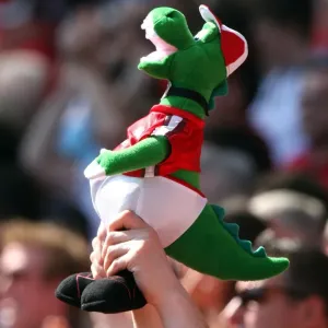 A fan holds up a mini Gunner
