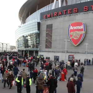 Fans gather outside the stadium