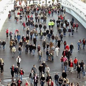 Fans use the Clock End Bridge to get to the stadium
