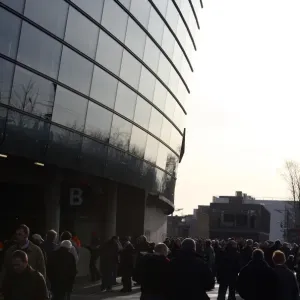 Fans walk around the stadium