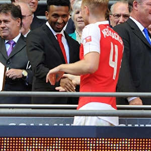 A Father-Son Connection: Per Mertesacker and Ryan Rocastle's Emotional Reunion at the FA Community Shield (Arsenal vs. Chelsea, 2015)