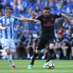 Fierce Rivalry: Sead Kolasinac vs. Jonathan Hogg in the Huddersfield Town vs. Arsenal Clash Fierce Rivalry: Sead Kolasinac vs. Jonathan Hogg in the Huddersfield Town vs. Arsenal Clash