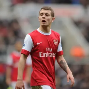 Fierce Rivalry: Wilshere's Thrilling 4-4 Battle at St. James Park
