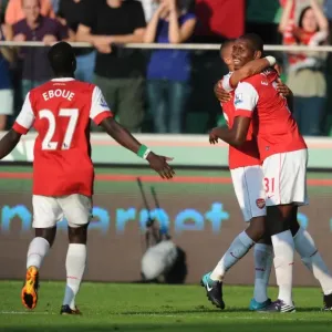Five-Star Celebration: Jay Emmanuel Thomas, Kieran Gibbs, and Emmanuel Eboue Rejoice in Arsenal's 5-Goal Blitz Against Legia Warsaw Five-Star Celebration: Jay Emmanuel Thomas, Kieran Gibbs, and Emmanuel Eboue Rejoice in Arsenal's 5-Goal Blitz Against Legia Warsaw