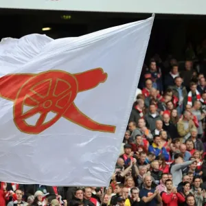 A flag is waved before the match. Arsenal 4: 1 Norwich City. Barclays Premier League A flag is waved before the match. Arsenal 4: 1 Norwich City. Barclays Premier League