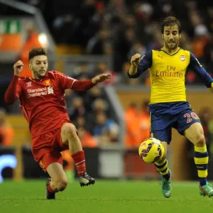 Flamini vs Lallana: Intense Battle in the Premier League Clash Between Liverpool and Arsenal Flamini vs Lallana: Intense Battle in the Premier League Clash Between Liverpool and Arsenal