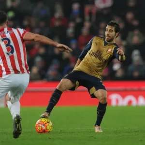 Flamini vs Pieters: A Fierce Battle at Stoke City vs Arsenal (2015-16)