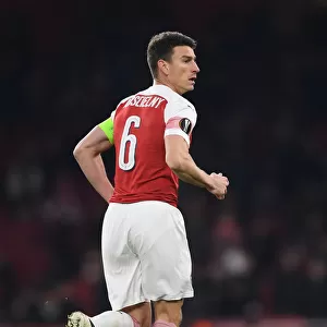 Focused Koscielny: Arsenal's Unyielding Defender in Europa League Battle Against Qarabag