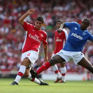 Fran Merida (Arsenal) Aaron Mokoena (Portsmouth)