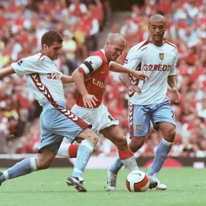 Freddie Ljungberg (Arsenal) Aaron Hughes (Villa) Freddie Ljungberg (Arsenal) Aaron Hughes (Villa)