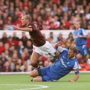 Print of Freddie Ljungberg being fouled by Kenny Cunningham Print of Freddie Ljungberg being fouled by Kenny Cunningham