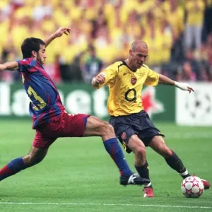 Freddie Ljungberg (Arsenal) Oleguer (Barcelona) Freddie Ljungberg (Arsenal) Oleguer (Barcelona)