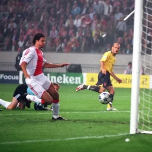 Freddie Ljungberg scores over Hans Vonk Print Freddie Ljungberg scores over Hans Vonk Print