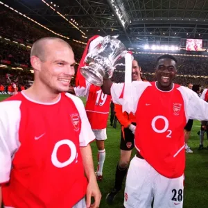 Freddie Ljungberg, Kolo Toure and Thierry Henry (Arsenal) with the FA Cup Trophy Freddie Ljungberg, Kolo Toure and Thierry Henry (Arsenal) with the FA Cup Trophy