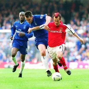 Fredrik Ljungberg breaks past John Terry to score the 2nd Arsenal goal