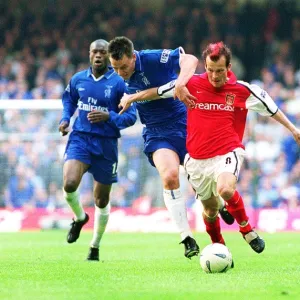 Fredrik Ljungberg breaks past John Terry to score the 2nd Arsenal goal