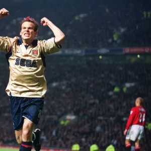 Fredrik Ljungberg celebrates the Arsenal goal, scored by Sylvain Wiltord