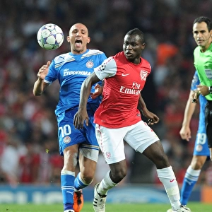 Frimpong Steals the Ball from Djebbour in Thrilling Arsenal-Olympiacos UCL Clash