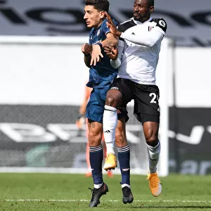 Fulham vs Arsenal: Hector Bellerin Clashes with Andre-Frank Anguissa in Premier League Showdown