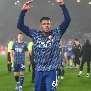 Gabriel Celebrates Print with Arsenal Fans at Elland Road