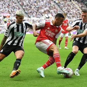 Gabriel Jesus Faces Off Against Bruno Guimaraes and Sven Botman in Intense Newcastle United vs. Arsenal FC Clash (Premier League 2022-23)