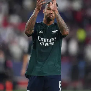 Gabriel Magalhaes Triumphant Salute: Arsenal's Victory Over Sevilla in the 2023-24 UEFA Champions League Gabriel Magalhaes Triumphant Salute: Arsenal's Victory Over Sevilla in the 2023-24 UEFA Champions League