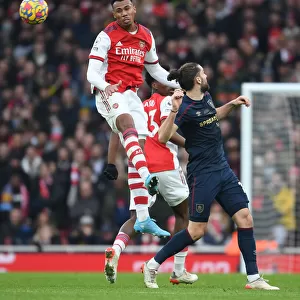 Gabriel Soars Over Rodriguez: Intense Aerial Battle in Arsenal vs. Burnley Premier League Clash
