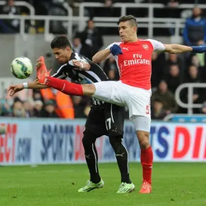 Gabriel vs. Ayoze Perez: Intense Battle in Newcastle United vs. Arsenal Premier League Clash