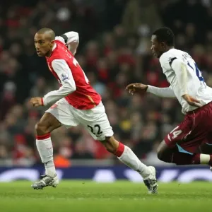Gael Clichy (Arsenal) John Pantsil (West Ham) Gael Clichy (Arsenal) John Pantsil (West Ham)