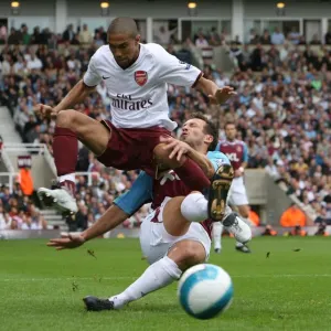Gael Clichy (Arsenal) Lucas Neill (West Ham) Gael Clichy (Arsenal) Lucas Neill (West Ham)