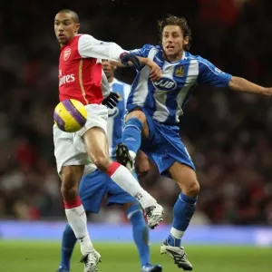 Gael Clichy (Arsenal) Michael Brown (Wigan) Gael Clichy (Arsenal) Michael Brown (Wigan)