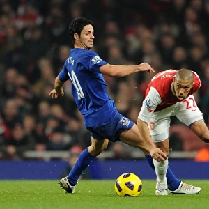 Gael Clichy (Arsenal) Mikel Arteta (Everton). Arsenal 2: 1 Everton. Barclays Premier League