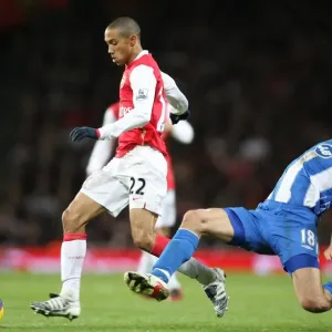 Gael Clichy (Arsenal) Paul Scharner (Wigan) Gael Clichy (Arsenal) Paul Scharner (Wigan)