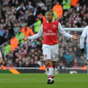 Gael Clichy (Arsenal) talks to referee Mark Clattenburg Gael Clichy (Arsenal) talks to referee Mark Clattenburg