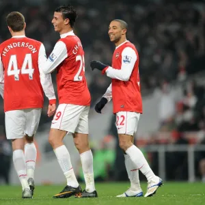 Gael Clichy celebrates scoring Arsenals 5th goal with Conor Henderson