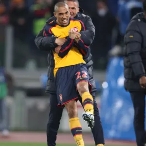 Gael Clichy and Kieran Gibbs celebrate Arsenal winning