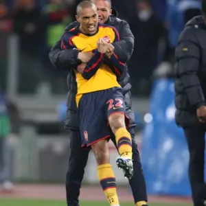 Gael Clichy and Kieran Gibbs celebrate Arsenal winning Gael Clichy and Kieran Gibbs celebrate Arsenal winning