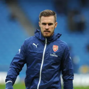 Gearing Up for the Big Battle: Aaron Ramsey's Focused Warm-Up (Manchester City vs Arsenal, Premier League 2014-15)