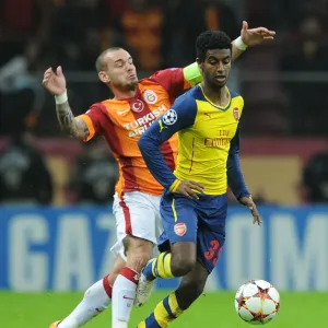 Gedion Zelalem Outmaneuvers Wesley Sneijder: Galatasaray vs. Arsenal, UEFA Champions League, Istanbul, 2014 Gedion Zelalem Outmaneuvers Wesley Sneijder: Galatasaray vs. Arsenal, UEFA Champions League, Istanbul, 2014