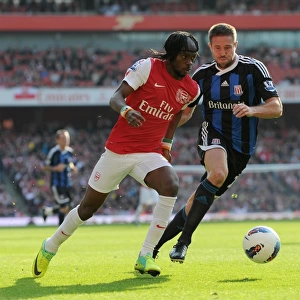 Gervinho (Arsenal) Matthew Upson (Stoke). Arsenal 3: 1 Stoke City. Barclays Premier League