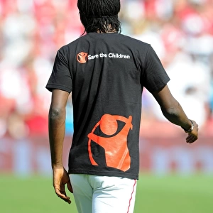 Gervinho (Arsenal) in a Save the Children t shirt. Arsenal 1: 1 New York Red Bulls