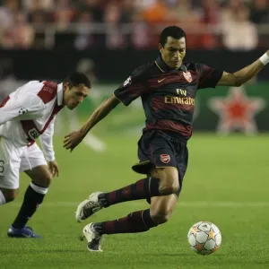 Gilberto (Arsenal) Adriano (Seville) Gilberto (Arsenal) Adriano (Seville)