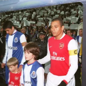 Gilberto (Arsenal) Lucho Gonzalez (Porto) lead out their teams Gilberto (Arsenal) Lucho Gonzalez (Porto) lead out their teams