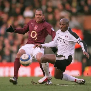 Gilberto (Arsenal) Luis Boa Morte (Fulham). Fulham 0: 4 Arsenal. FA Premiership Gilberto (Arsenal) Luis Boa Morte (Fulham). Fulham 0: 4 Arsenal. FA Premiership